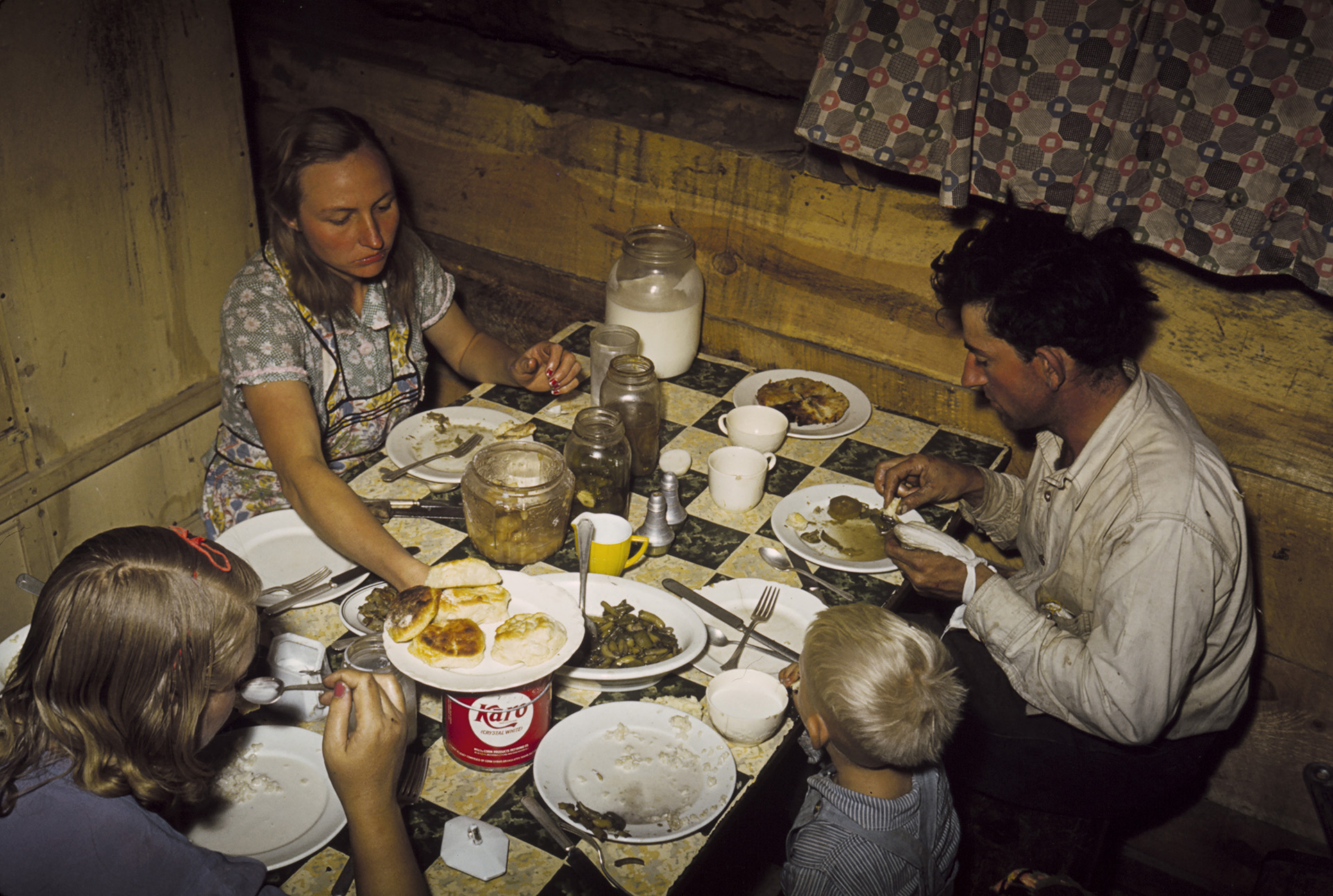 Russell Lee The Faro Caudill Family Eating Dinner in Their Dugout, Pie Town, New Mexico, 1940 Courtesy The Library of Congress Prints and Photographs Division